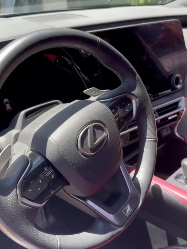 Lexus interior detailed with red accents